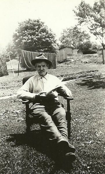 File:Michael Berish enjoying his local newspaper..jpg